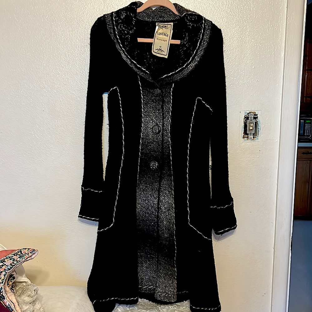 Vintage concept, Victorian detail, black duster.